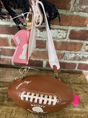 Betsey Johnson Brown Football Crossbody Bag with Pink Strap & Charm